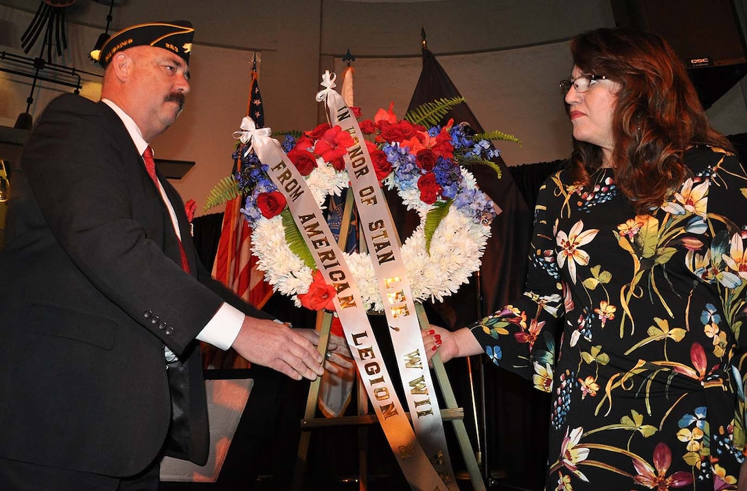 Jere Romano, post commander of the American Legion No. 283, Pacific Palisades, California, left, along with his wife, Martha, right, place a wreath by a cement plaque of Marvel Comic book legend Stan Lee’s signature during “Excelsior! A Celebration of the Amazing, Fantastic, Incredible and Uncanny Life of Stan Lee” Jan. 30 at the TCL Chinese Theatre in Hollywood, California. The event was a memorial tribute to Lee, Marvel comic book writer, editor, publisher and co-creator, who died in November 2018. Lee was an Army veteran and former writer in the U.S. Army Signal Corps during World War II.