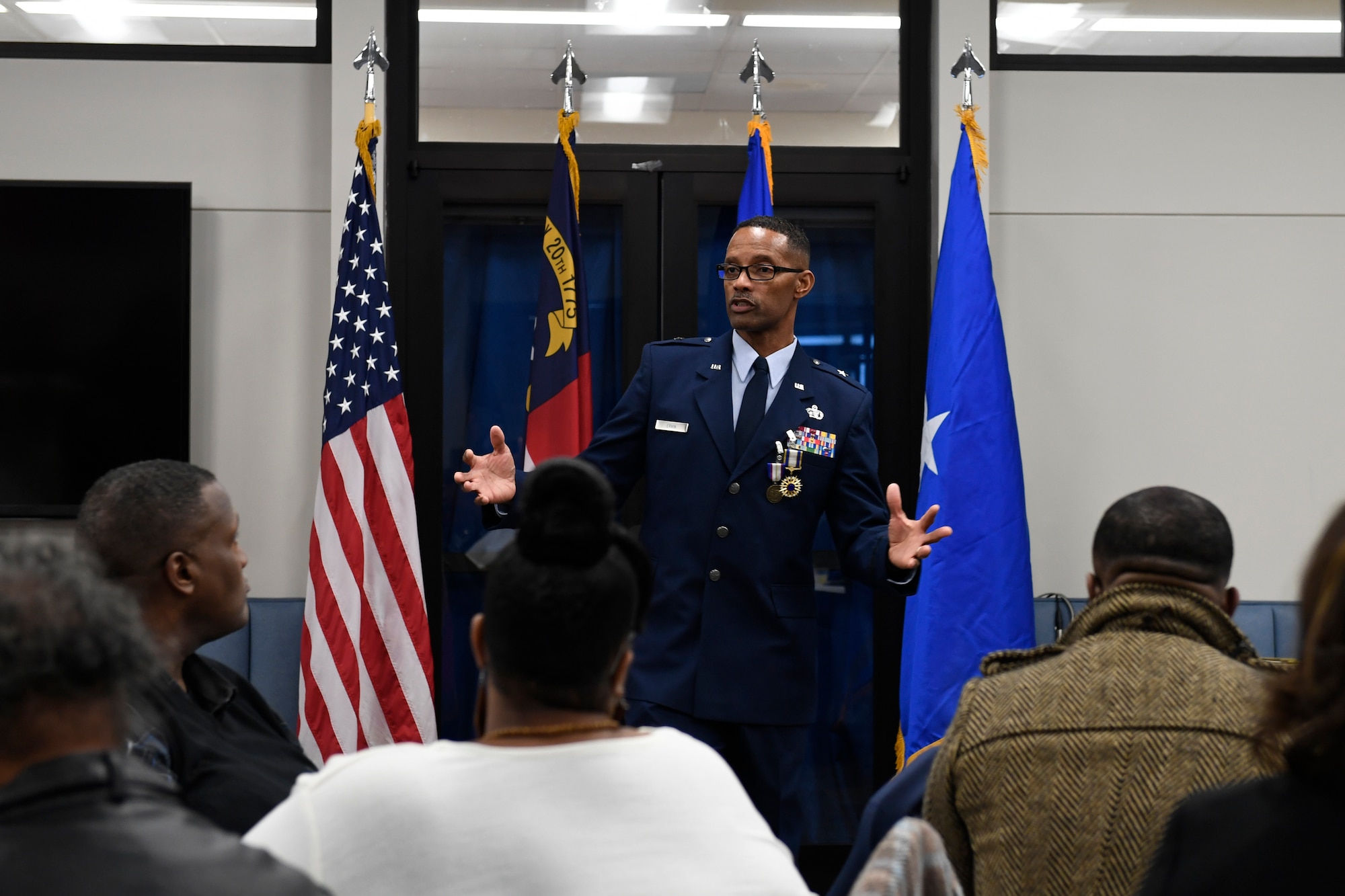 U.S. Air Force Brig. Gen. Clarence Ervin talks to family members during the retirement reception at the North Carolina Air National Guard Base (NCANG), Charlotte Douglas International Airport, Feb. 09, 2019. Family, friends and guard members gathered to celebrate the retirement of Gen. Ervin, Chief of Staff for the NCANG, after serving in the military for 37 years.