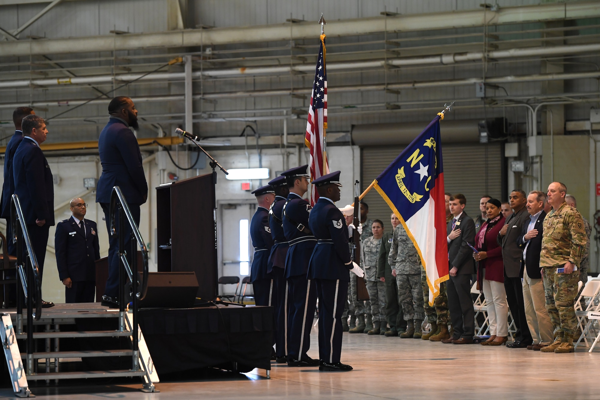 Chris Ervin sings the National Anthem during his father’s retirement ceremony, U.S. Air Force Brig. Gen. Clarence Ervin, at the North Carolina Air National Guard Base (NCANG), Charlotte Douglas International Airport, Feb. 09, 2019. Family, friends and guard members gathered to celebrate the retirement of Gen. Ervin, Chief of Staff for the NCANG, after serving in the military for 37 years.