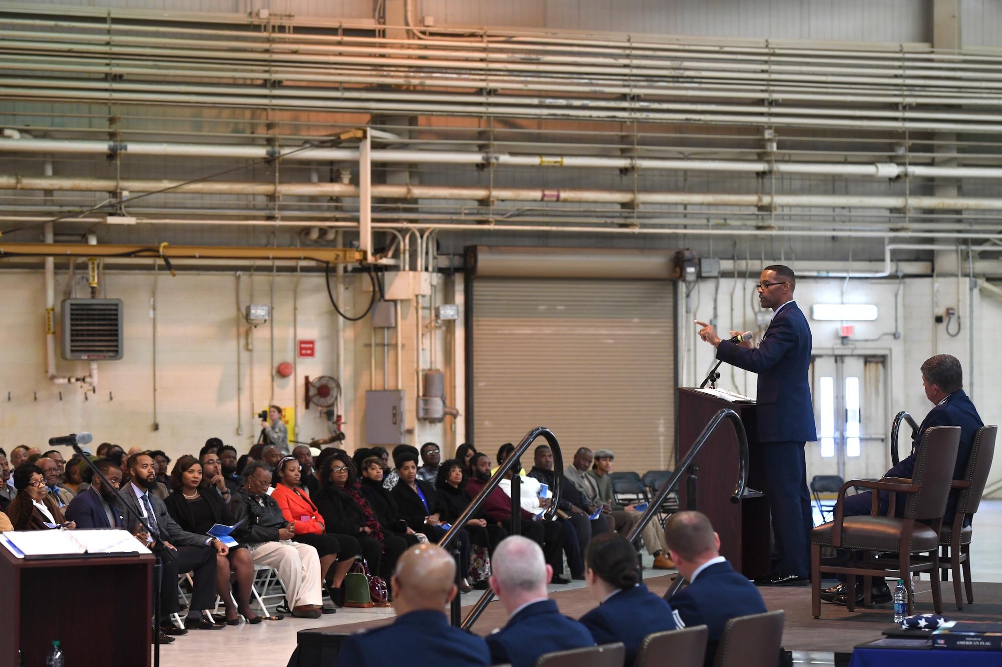 U.S. Air Force Brig. Gen. Clarence Ervin delivers his speech to family members during his retirement ceremony at the North Carolina Air National Guard Base (NCANG), Charlotte Douglas International Airport, Feb. 09, 2019. Family, friends and guard members gathered to celebrate the retirement of Gen. Ervin, Chief of Staff for the NCANG, after serving in the military for 37 years.