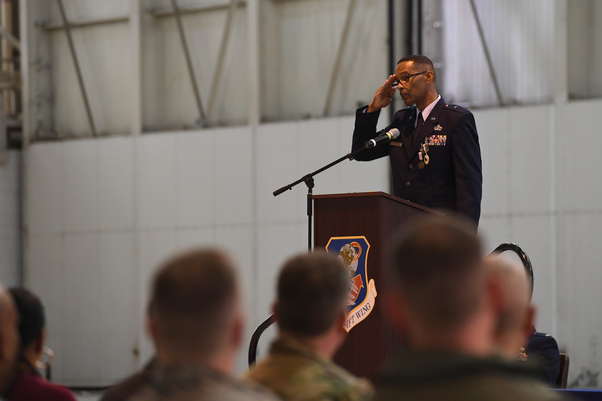 U.S. Air Force Brig. Gen. Clarence Ervin renders a final salute to fellow guard members after delivering a speech during his retirement ceremony at the North Carolina Air National Guard Base (NCANG), Charlotte Douglas International Airport, Feb. 09, 2019. Family, friends and guard members gathered to celebrate the retirement of Gen. Ervin, Chief of Staff for the NCANG, after serving in the military for 37 years.