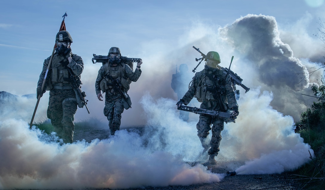 U.S. Marines from 1st Battalion, 1st Marine Regiment, 1st Marine Division hike through a simulated chemical attack at Marine Corps Base, Camp Pendleton, California, Jan. 12, 2019. Marines train in extreme environments in order to achieve maximum lethality during the intensity of war.