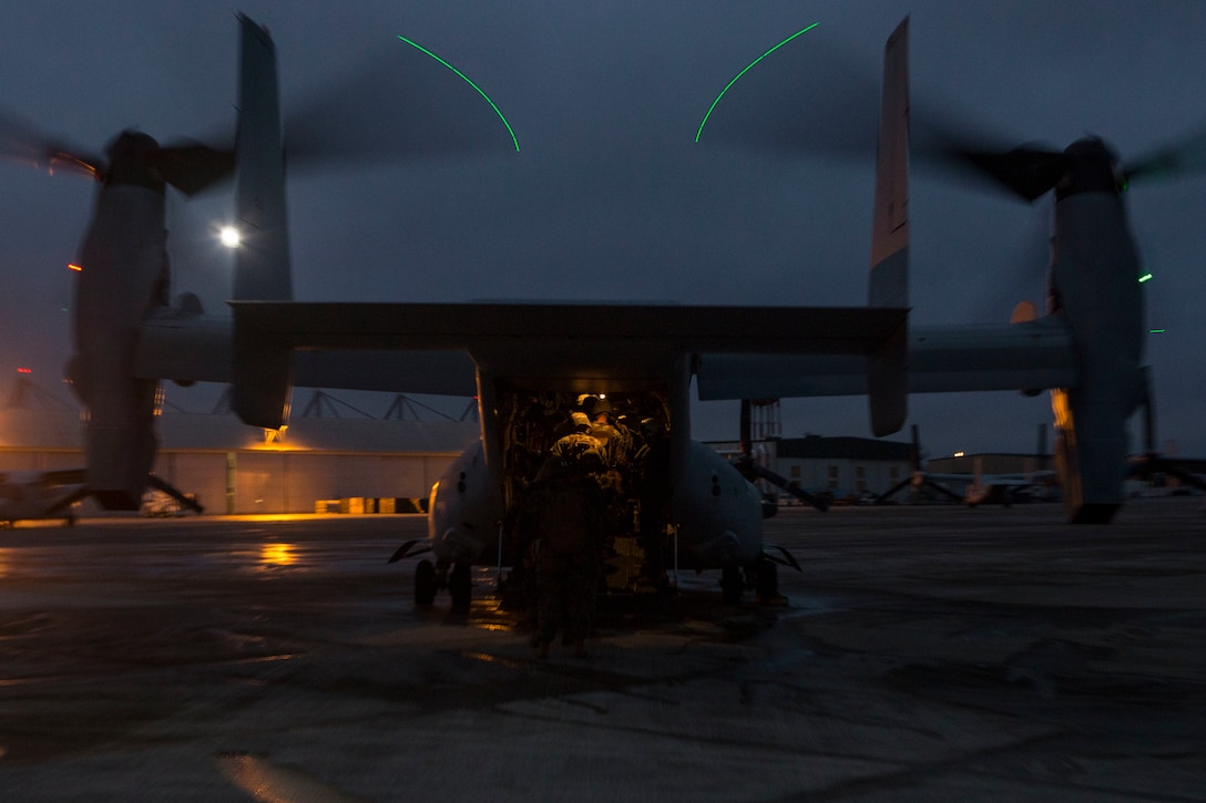 Marines board an MV-22B Osprey while rehearsing response procedures for a Tactical Recovery of Aircraft and Personnel scenario on Marine Corps Air Station New River, North Carolina Feb. 16, 2019. The scenario was conducted to increase proficiency and enhance procedures as a Marine Air-Ground Task Force. The Marines are with 1st Battalion, 8th Marine Regiment. The aircraft is with Marine Medium Tiltrotor Squadron 261.