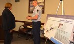 Master Sgt. Jason Wilson (right), manager of the Air Force Ground Munitions Program at the Air Force Security Forces Center, explains the benefits of the new Air Force M18 modular handgun system to Lorna Estep, Air Force Installation and Mission Support Center executive director, Feb. 4. Since taking her position, Estep has taken a closer look into how AFIMSC executes its mission during immersion briefings with the center’s primary subordinate units over the past month.