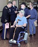 Veteran patients walking down the hall from pharmacy were greeted by Col. Peter Velesky, Joint Base San Antonio and 502nd Air Base Wing vice commander and Chief Master Sgt. Christopher Lantagne, JBSA and 502d ABW command chief at the Audie L. Murphy Memorial Veterans Hospital, National Salute to Veteran Patients, Feb. 15.