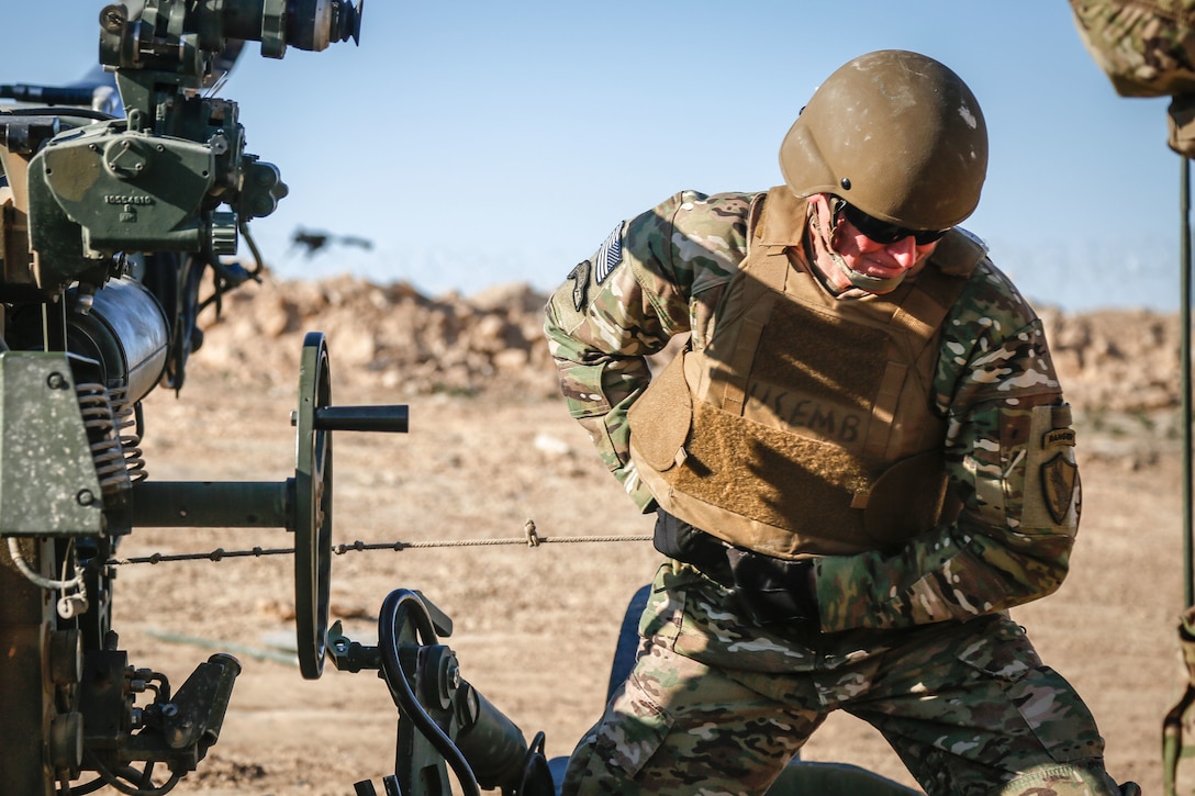 U.S. Central Command commander, Gen. Joseph Votel, pulls the lanyard on an M777A2 howitzer during a fire mission at Fire Base Saham, Jan. 18, 2019. Gen. Votel visited from the 101st Airborne Division Troopers deployed in support of Combined Joint Task Force - Operation Inherent Resolve, working with partner forces to defeat ISIS in designated areas of Iraq and Syria.  (U.S. Army Photo by SPC. Gyasi Thomasson)