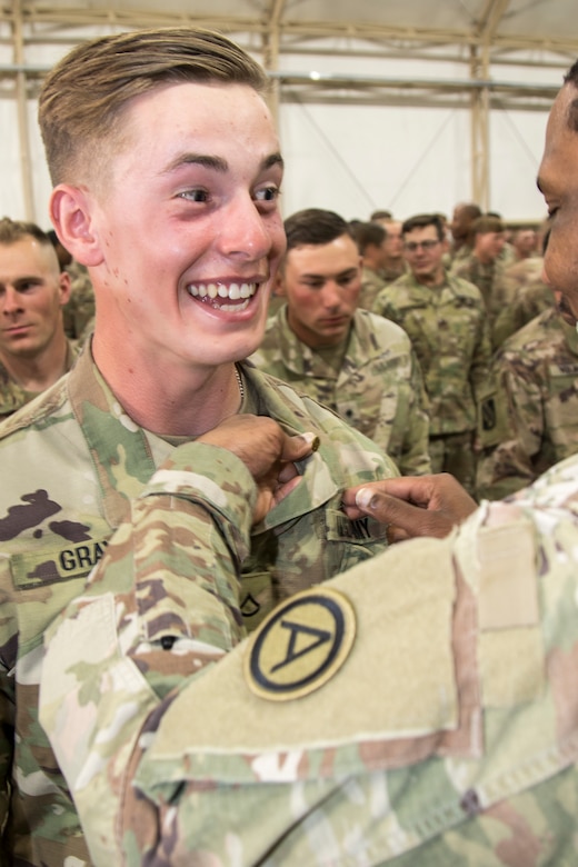 Army Pfc. Daniel Gray, a paralegal specialist assigned to the Area Support Group-Kuwait, U.S. Army Central, was awarded the Air Assault Badge on day ten of Air Assault School’s Class 301-19, Feb. 15, 2019, at Camp Buehring, Kuwait. Soldiers currently serving in U.S. Army Central's area of operations earned the Air Assault Badge after developing additional skills, including moving equipment and rappelling, to benefit their unit while forward deployed.