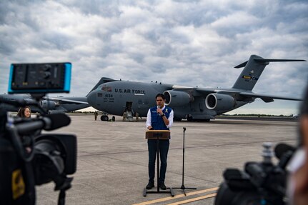 Lester Toledo, a representative of the interim government of Venezuela, gives a press conference in front of A C-17 Globemaster III before delivering humanitarian aid from Homestead Air Reserve Base, FL to Cucuta, Colombia February 16, 2019.