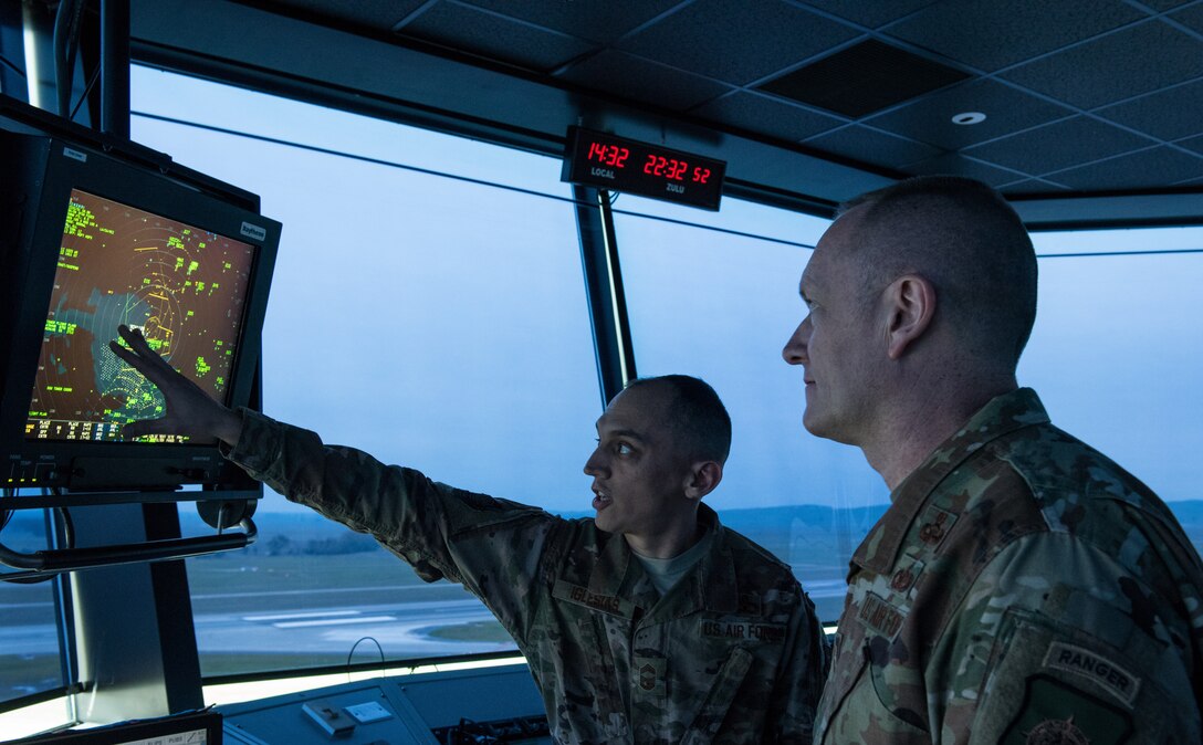 U.S. Air Force Chief Master Sgt. Jason France, U.S. Transportation Command senior enlisted leader, is briefed on the challenges of controlling aircraft and TRANSCOM sorties in and out of Travis Air Force Base’s airspace by Chief Master Sergeant David Iglesias, 60th Operations Support Squadron Chief Controller, RAPCON, Feb. 8, 2019, in the control tower at Travis Air Force Base, California. USTRANSCOM is a unified, functional combatant command which provides support to the nine other U.S. combatant commands, the military services, defense agencies and other government organizations. (U.S. Air Force Photo by Tech. Sgt. Traci Keller)