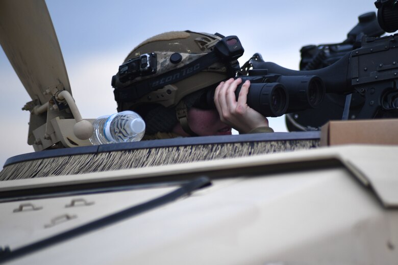 Senior Airman Anna Weaver, 921st Contingency Response Squadron security forces, monitors the perimeter area around the Geronimo Landing Zone during a mission in support of Green Flag Little Rock exercise, Feb. 11, 2019, Fort Polk, La. The primary objective of the exercise is to support the Joint Readiness Training Center and provide the maximum number of airlift crews, mission planners and ground support elements to a simulated combat environment with emphasis on joint force integration. (U.S. Air Force photo by Tech. Sgt. Liliana Moreno)