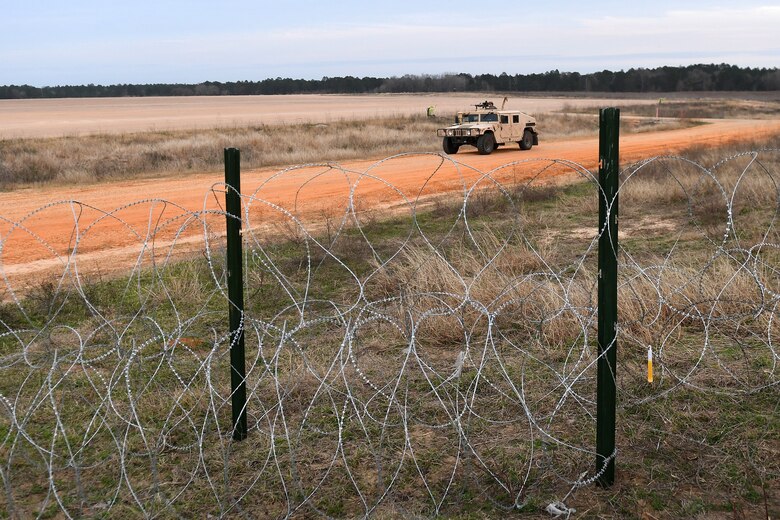 Contingency Response Forces assigned to the 821st Contingency Response Group out of Travis Air Force Base, Calif., secure the perimeter around the Geronimo Landing Zone during a mission in support of Green Flag Little Rock exercise, Feb. 11, 2019, Fort Polk, La. The primary objective of the exercise is to support the Joint Readiness Training Center and provide the maximum number of airlift crews, mission planners and ground support elements to a simulated combat environment with emphasis on joint force integration. (U.S. Air Force photo by Tech. Sgt. Liliana Moreno)