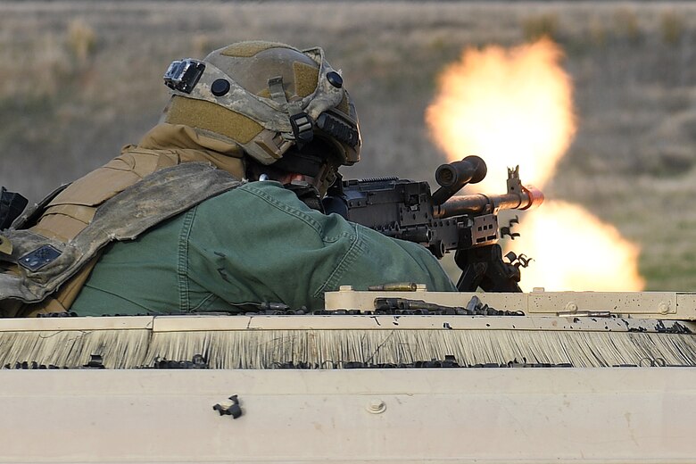 Staff Sgt. Keith Keiffer, 921st Contingency Response Squadron security forces, fires the M240B machine gun in response to a simulated gunfire attack at the Geronimo Landing Zone during a mission in support of Green Flag Little Rock exercise, Feb. 14, 2019, Fort Polk, La. The primary objective of the exercise is to support the Joint Readiness Training Center and provide the maximum number of airlift crews, mission planners and ground support elements to a simulated combat environment with emphasis on joint force integration. (U.S. Air Force photo by Tech. Sgt. Liliana Moreno)