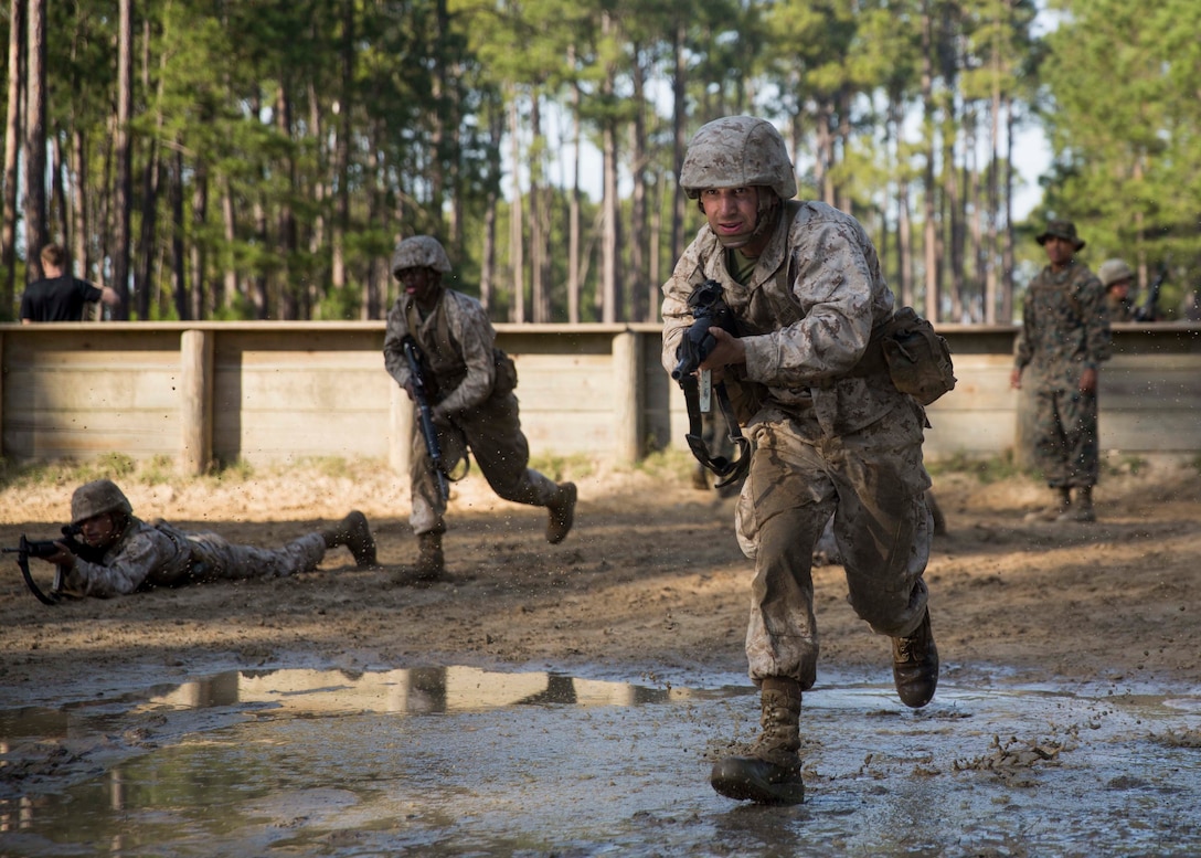 Michael Campofiori, a recruit with Platoon 2020, Company E, 2nd Recruit Training Battalion, Recruit Training Regiment, participates in the Day Movement Course as part of Basic Warrior Training at Marine Corps Recruit Depot Parris Island, South Carolina, Feb. 6, 2019. Campofiori, a native of Brick Township, New Jersey, overcame Leukemia and is now pursuing a career in the Marine Corps. BWT is a week-long training event that helps teach recruits the basics of combat survival and advanced rifle maneuvers. (U.S. Marine Corps photo by Lance Cpl. Jack A. E. Rigsby)