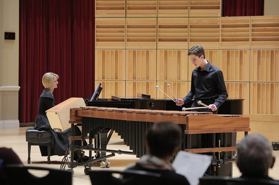 Five high school students from around the nation were selected for the final round of the Marine Band Concerto Competition, presented as a recital open to the public. Pictured is marimba player Joseph Batterman. The winner, euphonium player Peyton Sills, received a $2,500 scholarship, presented by Maj. Gen. James Kessler (USMC, ret.), CEO of the Marine Corps Heritage Foundation. He will perform his solo with the Marine Band in concert on March 31. Runner up, flute player Israel Perez, won a $500 scholarship. (U.S. Marine Corps photo by Master Sgt. Kristin duBois/released.)
