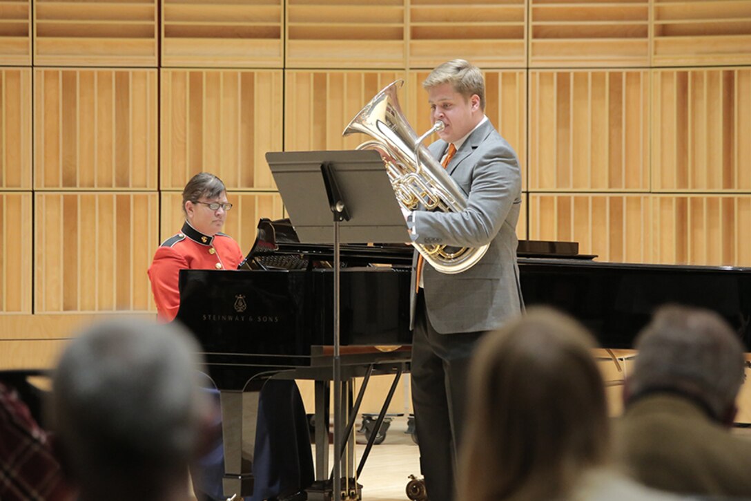 Five high school students from around the nation were selected for the final round of the Marine Band Concerto Competition, presented as a recital open to the public. The winner, euphonium player Peyton Sills, received a $2,500 scholarship, presented by Maj. Gen. James Kessler (USMC, ret.), CEO of the Marine Corps Heritage Foundation. He will perform his solo with the Marine Band in concert on March 31. Runner up, flute player Israel Perez, won a $500 scholarship. (U.S. Marine Corps photo by Master Sgt. Kristin duBois/released.)