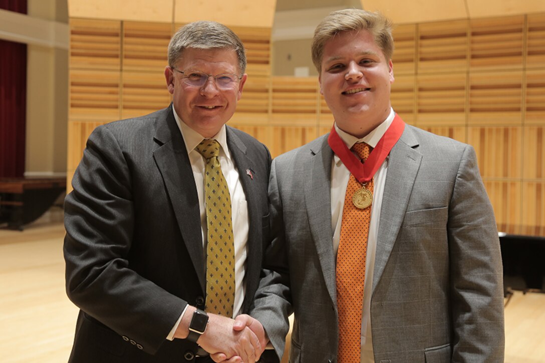 Five high school students from around the nation were selected for the final round of the Marine Band Concerto Competition, presented as a recital open to the public. Winner euphonium player Peyton Sills won a $2,500 scholarship presented by Maj. Gen. James Kessler (USMC, ret.), CEO of the Marine Corps Heritage Foundation. He will return on March 31 to perform his solo with the Marine Band. (U.S. Marine Corps photo by Master Sgt. Kristin duBois/released.)