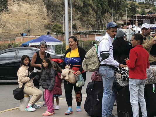Venezuelans cross the border between Ecuador and Colombia in search of new opportunities.