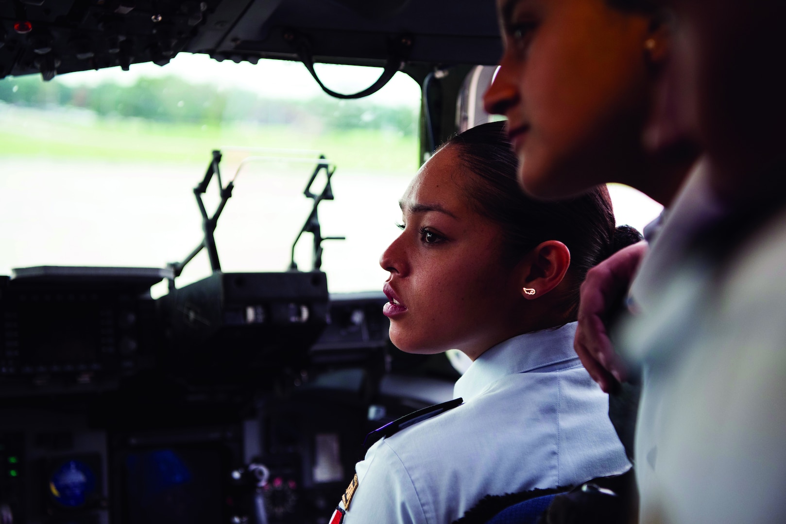 Karina Chavez Munoz, a cadet from the Mexican Air Force Academy, sits in the copilot seat on a C-17 Globemaster III Oct. 15, 2018, at Dover Air Force Base, Del. During their tour of Dover the cadets had lunch at Patterson Dining Facility and got to experience the C-17 and C-5M Super Galaxy up close. (U.S. Air Force photo by Airman 1st Class Zoe M. Wockenfuss181015-F-OK627-1086