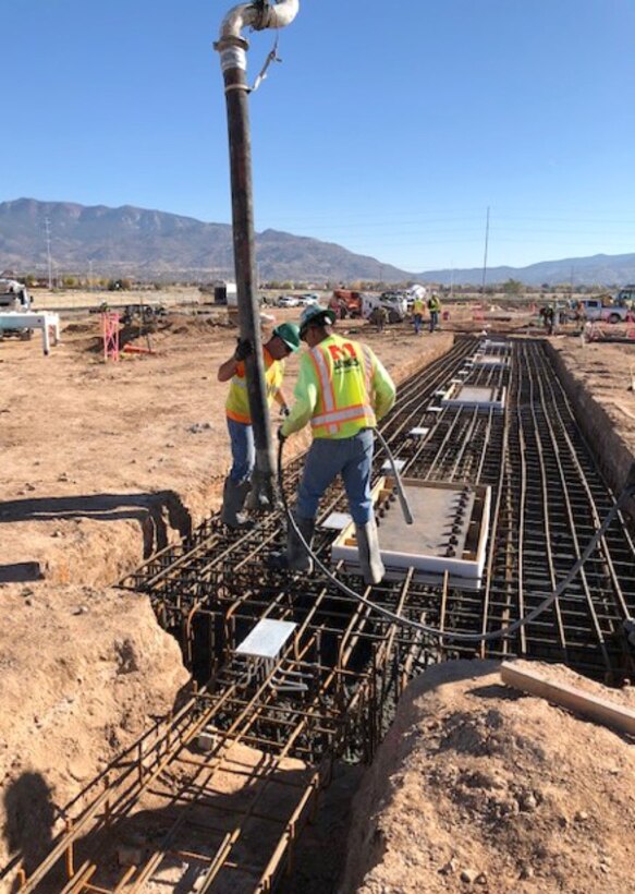Workers pour footings for the new NNSA building, Oct. 1, 2018.