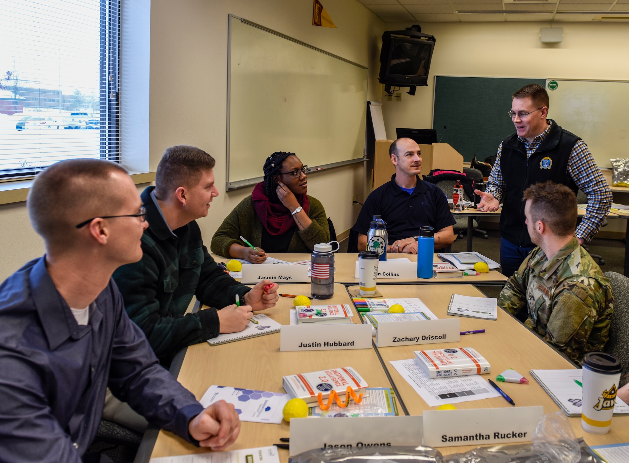 U.S. Air Force Col. J. Scot Heathman, 92nd Air Refueling Wing vice commander, engages in a class discussion with Airmen during an Emotional Intelligence (EQ) class at Fairchild Air Force Base, Washington, Feb. 15, 2019. Fairchild provides installation employees the opportunity to enroll in a bimonthly EQ resiliency class. EQ teaches people how to enhance their emotional skills by helping them recognize and manage their emotions.
(U.S. Air Force photo/Senior Airman Jesenia Landaverde)