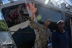 U.S. Navy Lt. David Cruz, Southern Partnership Station 2018’s Fleet Health Engagement Team (FHET) officer-in-charge, speaks with a Trinidad and Tobago (TTO) military professional as part of functional exercise Red Fish aboard a TTO coast guard vessel during Southern Partnership Station 2018.