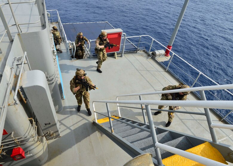 GULF OF THAILAND (Feb. 18, 2019) - Royal Marine commandos and Royal Navy sailors attached to the Duke-class frigate HMS Montrose (F 236) conduct a visit, board, search and seizure (VBSS) drill aboard the Henry J. Kaiser-class fleet replenishment oiler USNS Guadalupe (T-A 200).