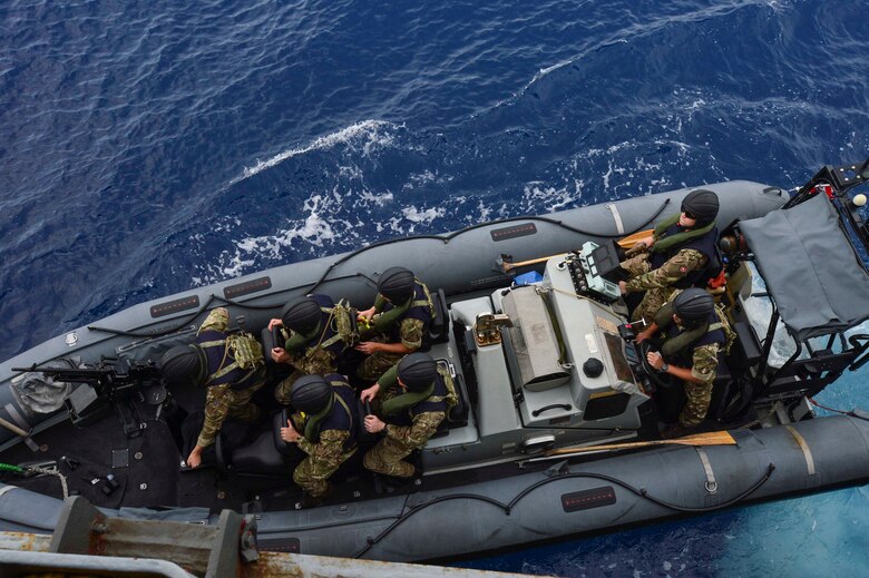 GULF OF THAILAND (Feb. 18, 2019) - Royal Marine commandos and Royal Navy sailors attached to the Duke-class frigate HMS Montrose (F 236), conduct a visit, board, search and seizure (VBSS) drill aboard the Henry J. Kaiser-class fleet underway replenishment oiler USNS Guadalupe (T-AO 200).