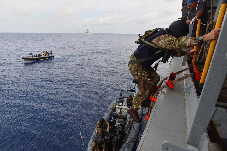 GULF OF THAILAND (Feb. 18, 2019) - Royal Marine commandos and Royal Navy sailors attached to the Duke-class frigate HMS Montrose (F 236) conduct a visit, board, search and seizure (VBSS) drill aboard the Henry J. Kaiser-class fleet replenishment oiler USNS Guadalupe (T-A 200).