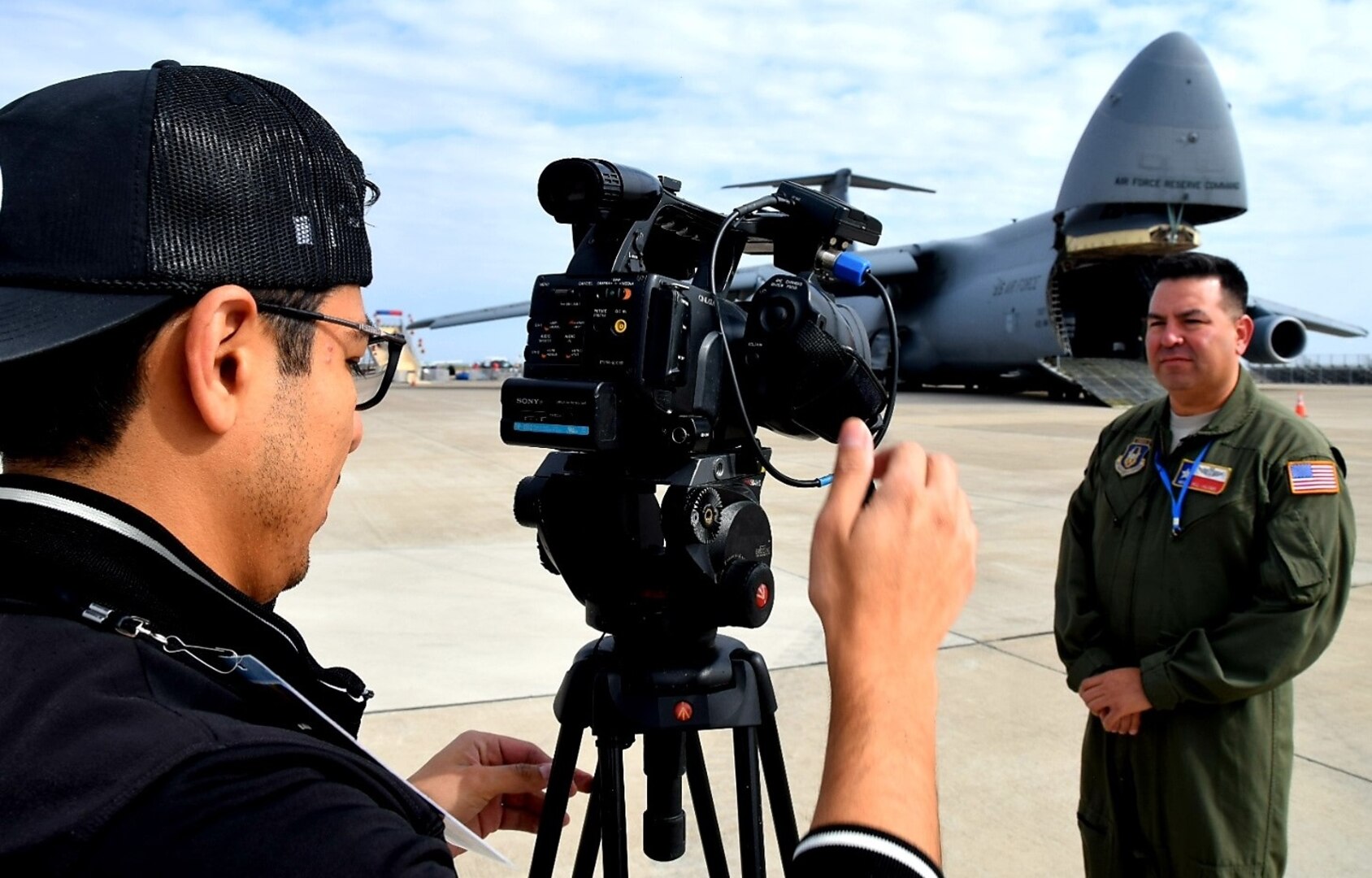 Master Sgt. Guillermo Jalomo, 68th Airlift Squadron loadmaster, prepares for an interivew with a local television station at the Laredo International Airport in Laredo, Texas Feb. 17, 2019. Jalomo, a Laredo United High School graduate, was part of the aircrew that flew the 433rd Airlift Wing’s C-5M Super Galaxy from Joint Base San Antonio-Lackland to the Washington’s Birthday Celebration Association Stars and Stripes Air Show Spectacular.