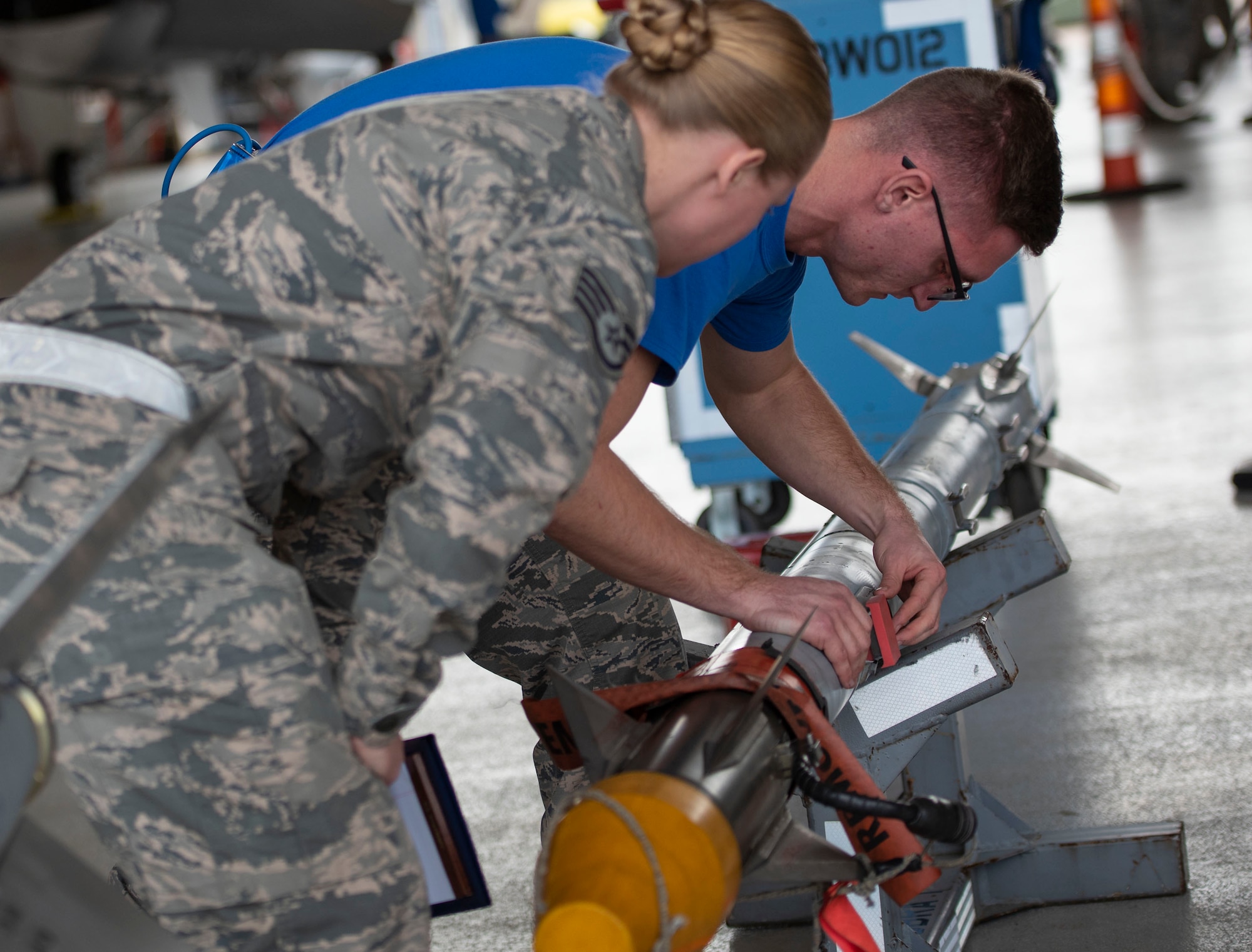 96th Aircraft Maintenance Squadron load crews compete during the annual weapons load competition for the title of Best Load Crew Of The Year. The fast-paced competition tests the knowledge and proficiency of the Airmen. The winning load crew is scheduled to be announced at the Maintenance Professionals of the Year Banquet in March.