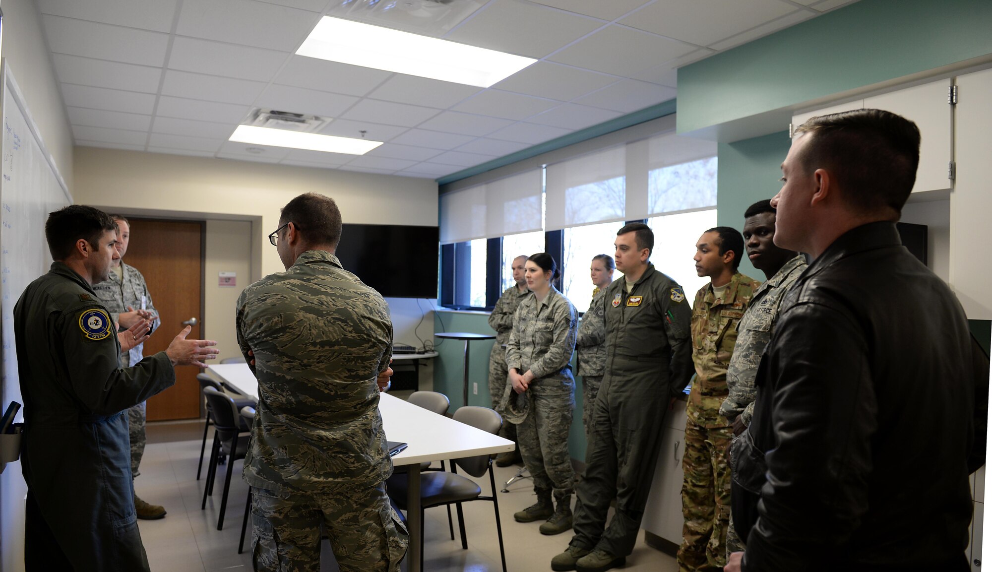 Airmen from the 552nd Air Control Wing at Tinker Air Force Base, Oklahoma, tour the Koritz Clinic with Capt. Scott Mckeithen, 14th Medical Group practice manager, and Maj. Ryan Brewer, 14th Flying Training Wing director of innovation, Feb. 13, 2018, on Columbus AFB, Mississippi. They visited areas in the 14th MDG to see how the Columbus AFB Spark Cell has aided in projects utilizing innovation for faster and better daily operations. (U.S. Air Force photo by Airman Hannah Bean)