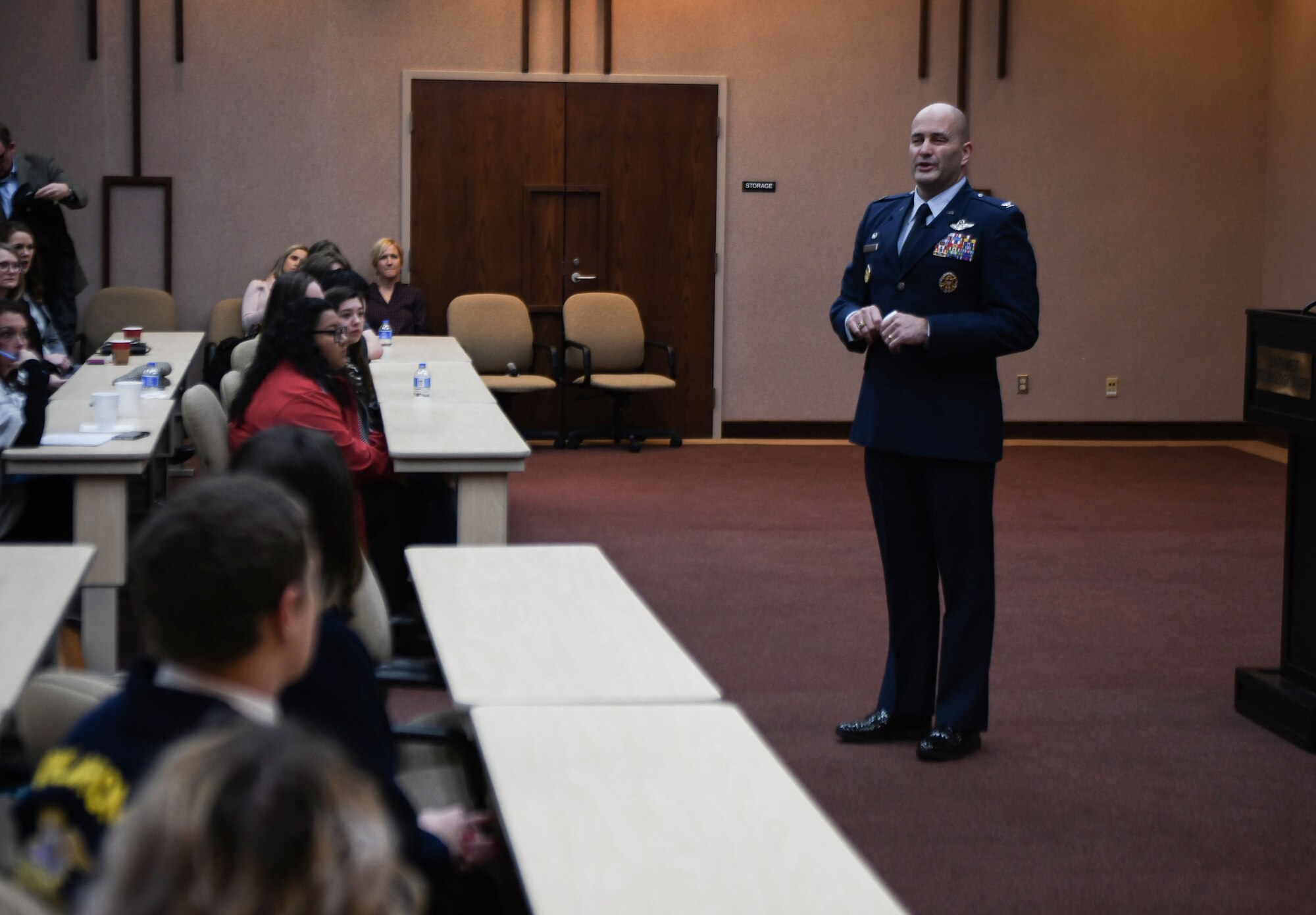 A man speaking to a crowd