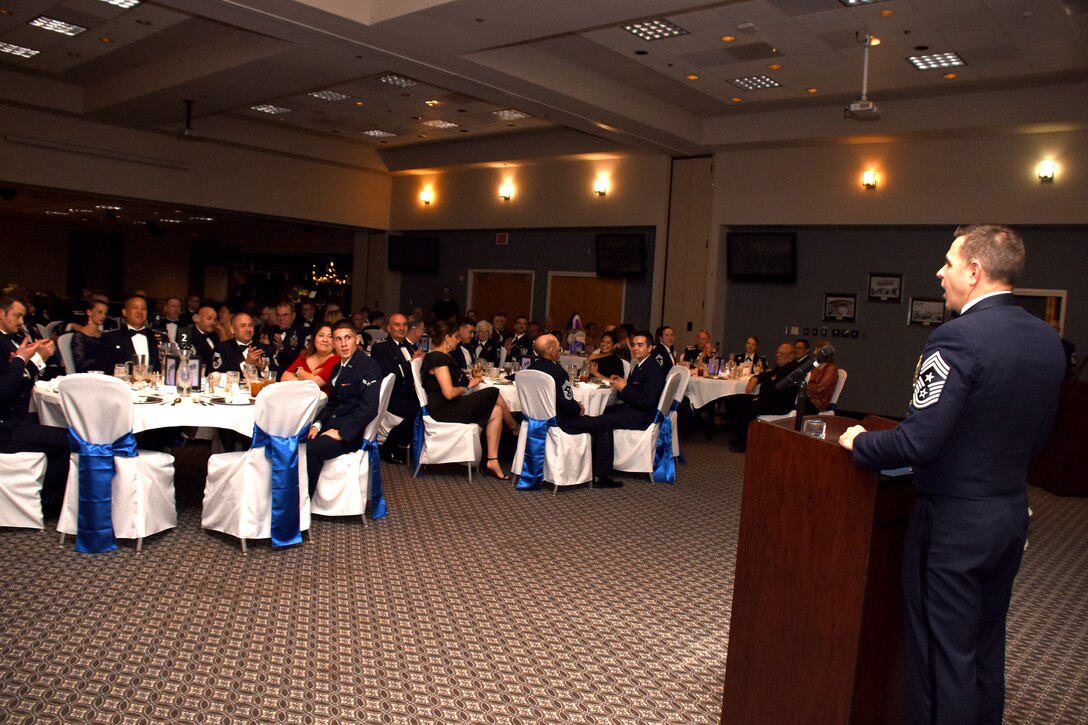 Guest speaker, U.S. Air Force Chief Master Sgt. Benjamin Higginbotham, Defense Intelligence Agency command senior enlisted leader, Joint Base Anacostia-Bolling, Washington D.C., congratulates the newest members of Goodfellow, to be inducted into the rank of Chief Master Sgt. during the Chief Induction Ceremony at the Event Center on Goodfellow Air Force Base, Texas, Feb. 15, 2019. Higginbotham shared personal experiences and words of advice to the inductees during his speech. (U.S. Air Force photo by Senior Airman Seraiah Hines/Released)