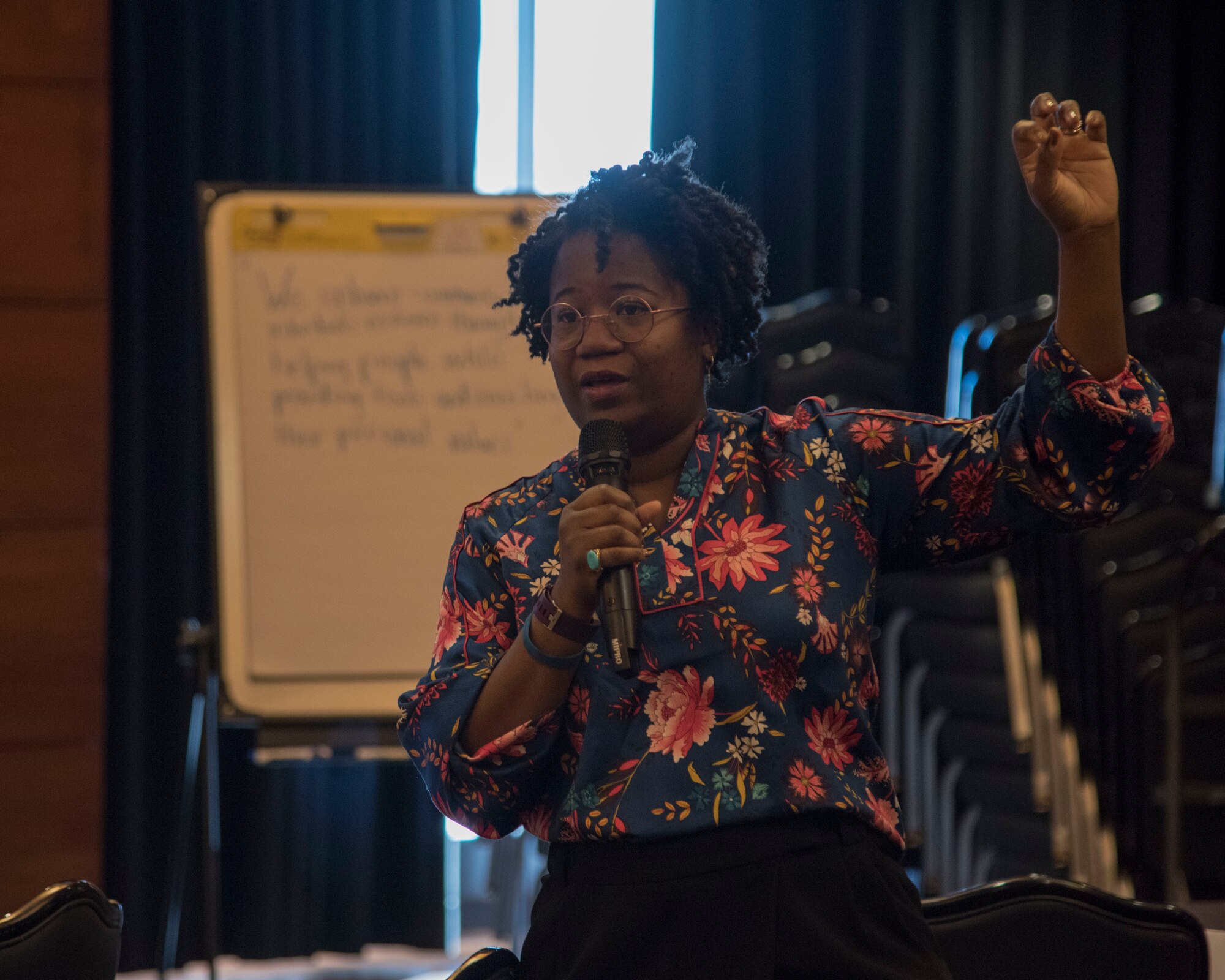 Sirajah Raheem, an Alteristic technical assistance specialist and senior trainer, speaks during a solution-driven Green Dot violence prevention seminar at Joint Base Elmendorf-Richardson, Alaska, Feb. 14, 2019. Since 2016, Green Dot facilitators across the Air Force have trained Airmen on what it means to be a bystander and steps they can take when issues arise, with the goal being to reduce or prevent sexual assault and violence. Beginning in January 2019, the Joint Installation Prevention Team shifted its focus from response to prevention when it comes to families in crisis.