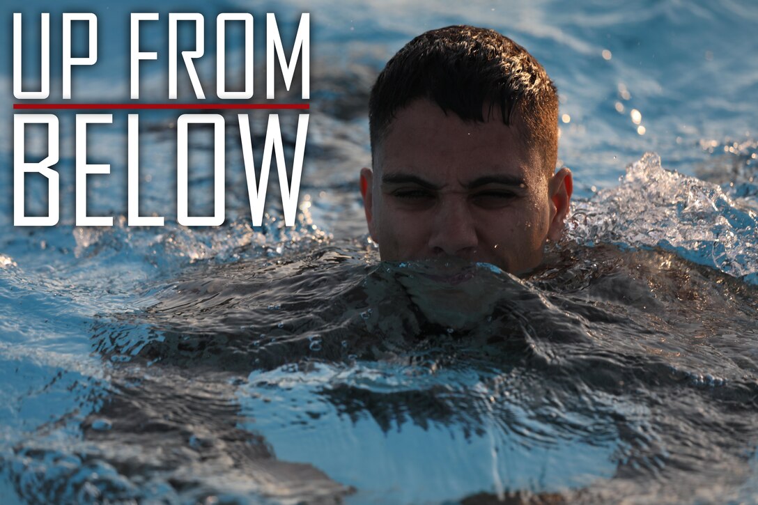 Second Lt. Vincent R. Santini swims 25 meters in shallow water during the basic swim qualification on Camp Foster, Okinawa, Japan Feb. 14, 2019. Marines regularly complete their swim qualification to remain deployable and maintain overall unit readiness and fitness. Marines from 3rd Marine Logistics Group joined units from 3rd Marine Division and Marine Corps Installations Pacific to complete the training. Santini, the Networking Platoon commander with Communications Company, Combat Logistics Regiment 37, 3rd Marine Logistics Group, is a native of Schertz, Texas. (U.S. Marine Corps photo by Lance Cpl. Armando Elizlade)