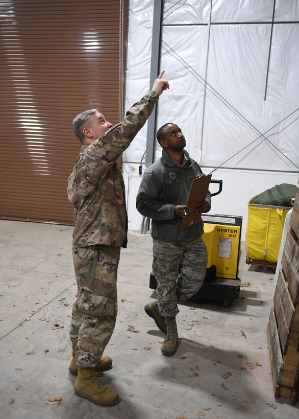 Tech. Sgt. Tobin Civils and Staff Sgt. Mamadou Bah, material management craftsmen with the 911th Logistics Readiness Squadron, assess the storage capacity of a new warehouse at the Pittsburgh International Airport Air Reserve Station, Pennsylvania, Feb. 14, 2019. The storage space in the warehouse will be used to house the mobility bag assets and readiness spares packages among other items. (U.S. Air Force Photo by Senior Airman Grace Thomson)