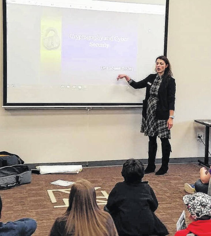 Dr. Lubjana Beshaj, a member of the Army Cyber Institute and a Teacher in the Department of Mathematical Sciences at the United States Military Academy (USMA) at West Point, addresses middle school students about Cryptography and Cyber Security.
