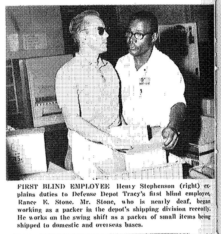 Henry Stephenson (right) explains duties to Rance Stone, Defense Depot Tracy’s first blind employee, who was also nearly deaf, as featured in the Dec. 26, 1969, issue of DSA News.