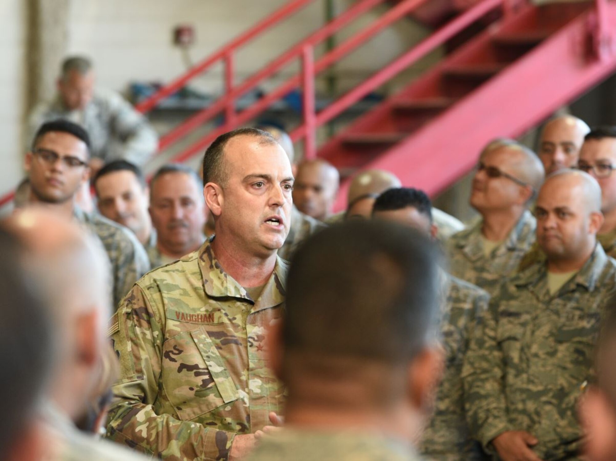 U.S. Air Force Brig. Gen. Edward L. Vaughan, Special Assistant to the Director, Air National Guard, for Puerto Rico Recovery addresses Airmen from the 156th Maintenance Squadron at a recent regularly scheduled drill.