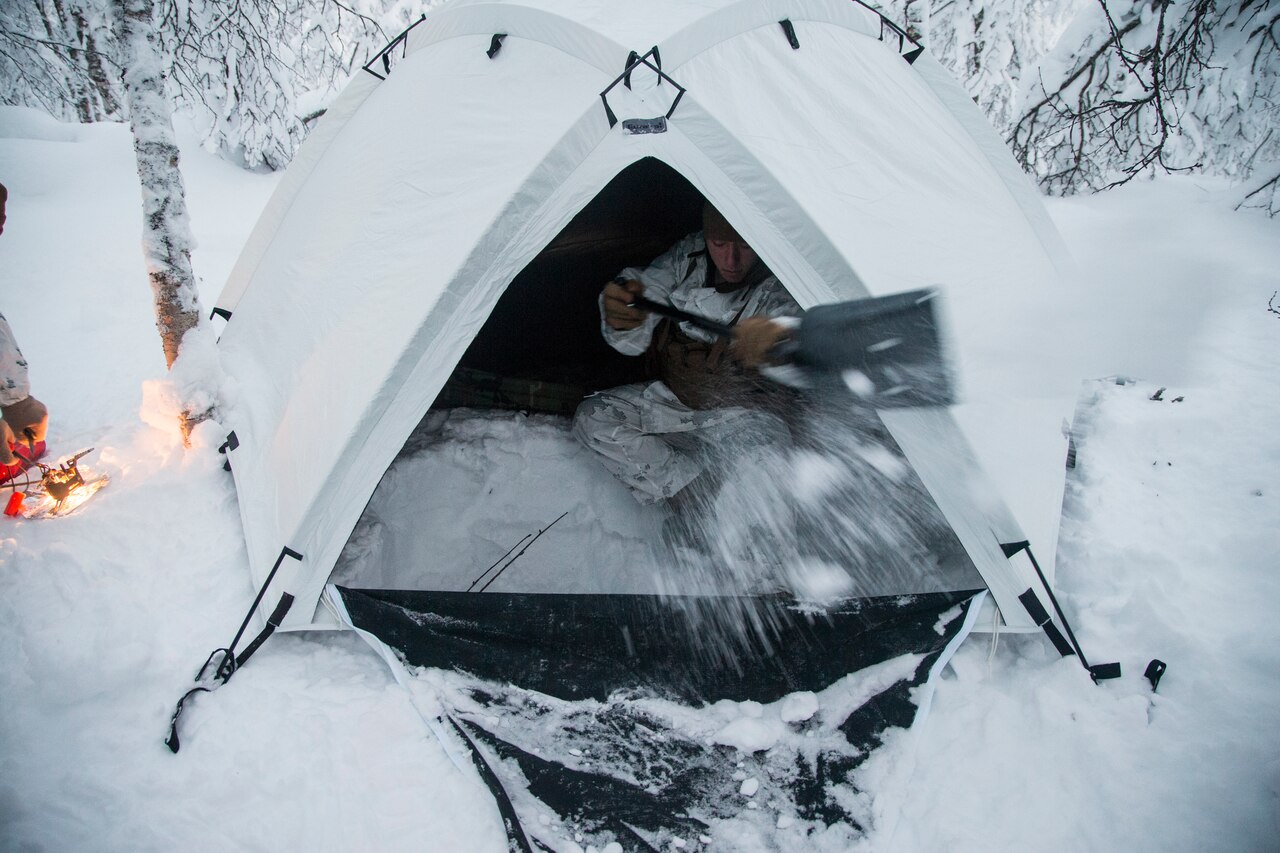 Marine digs snow