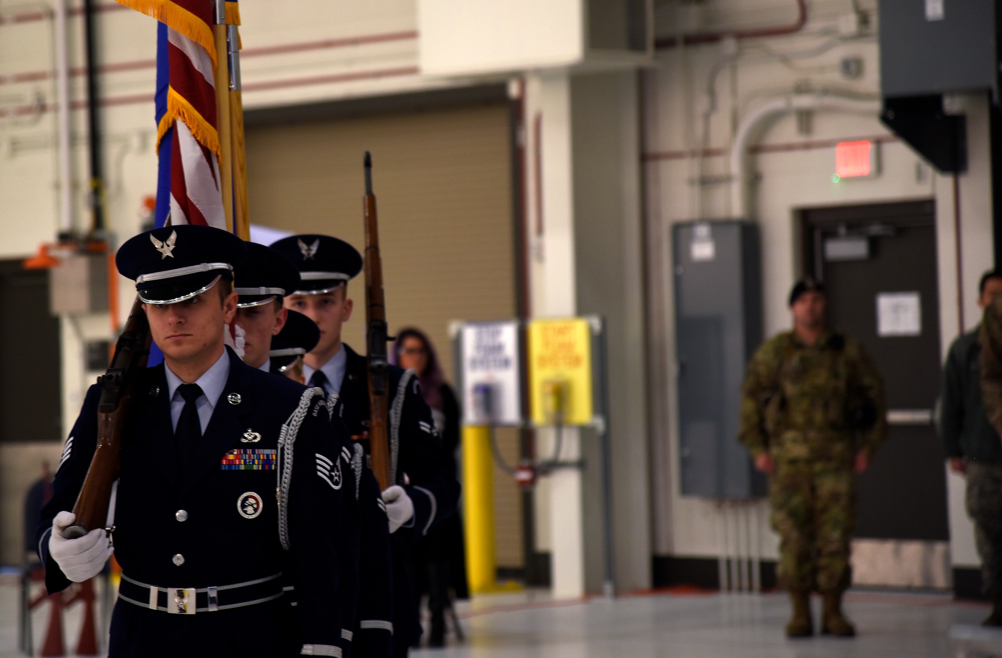 Base Honor Guardsmen prepare to post the colors prior to the 2018 Annual Awards Banquet Feb. 13, 2019, at McConnell Air Force Base, Kan. The annual awards banquet in a tradition that honors and celebrates Airmen who’ve performed exemplary service.