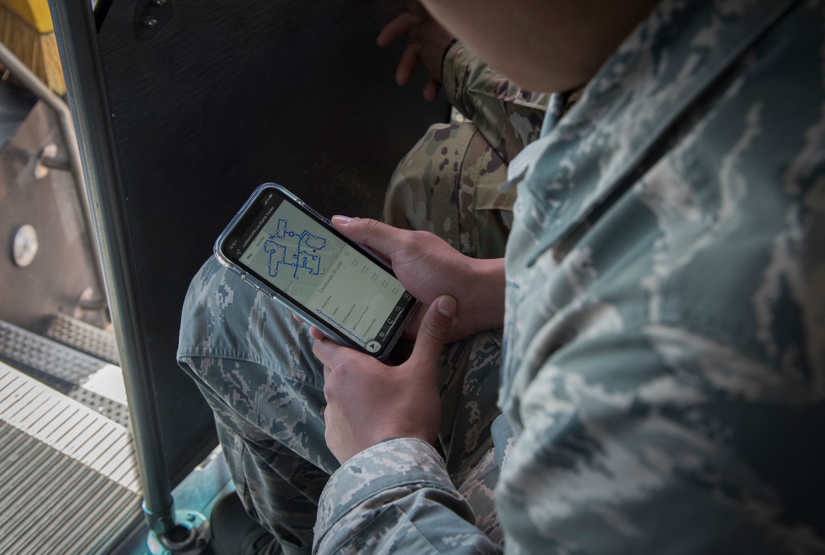 Airman 1st Class Michael Prado, 343rd Training Squadron student, navigates through the new “Ride Systems” application for Joint Base San Antonio shuttles at JBSA-Lackland Feb. 20, 2019.  The app includes Global Positioning System tracking capabilities with mapping and coordination with the ground transportation offices to track exactly where each bus is, their route and how long the wait time is.