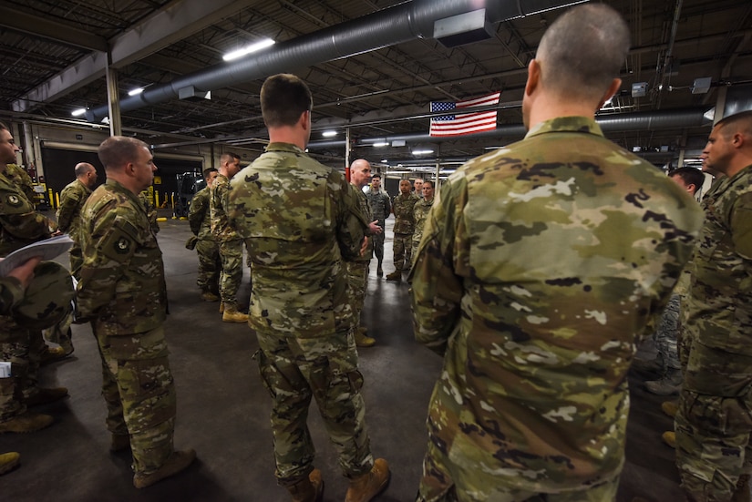Maj. Gen. Sam C. Barrett, 18th Air Force commander, briefs members of the Aerial Port Squadron Feb. 13, 2019, in the 437th APS Headquarters at Joint Base Charleston, S.C.