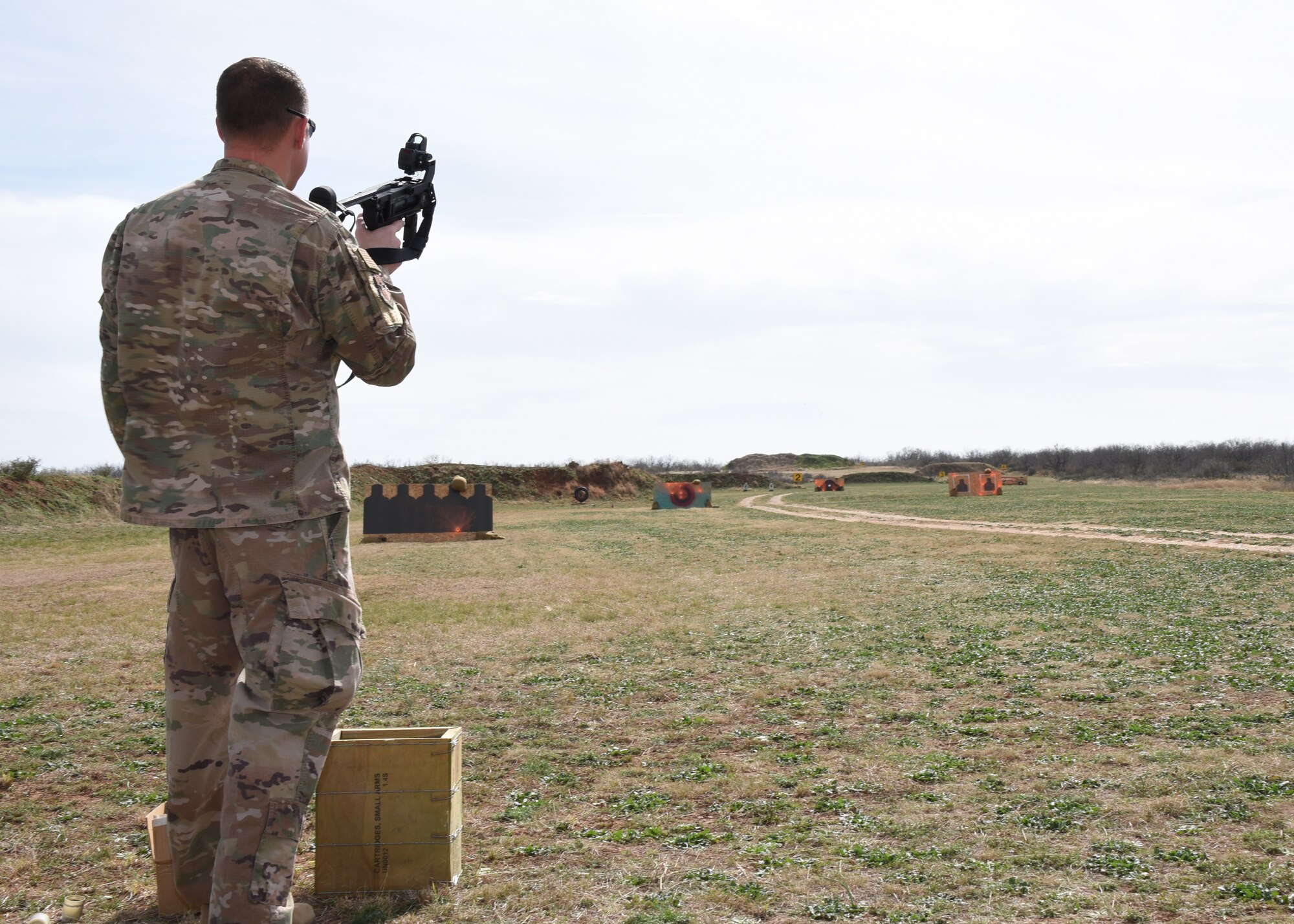 U.S. Air Force Master Sgt. Seth Swaboski, 17th Security Forces Squadron advisor, looks down the San Angelo Police Department firing range during a demonstration, Texas, Feb. 15, 2019. Members from Goodfellow spent the afternoon firing M203 grenade launchers, soon to be retired, and the M320 grenade launchers, which are taking their place. (U.S. Air Force photo by Airman 1st Class Zachary Chapman/Released)