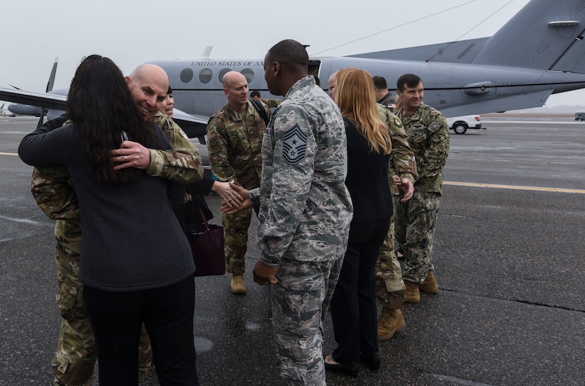 Maj. Gen. Sam C. Barrett, 18th Air Force commander, greets Joint Base Charleston leadership Feb. 11, 2019, at Joint Base Charleston, S.C.