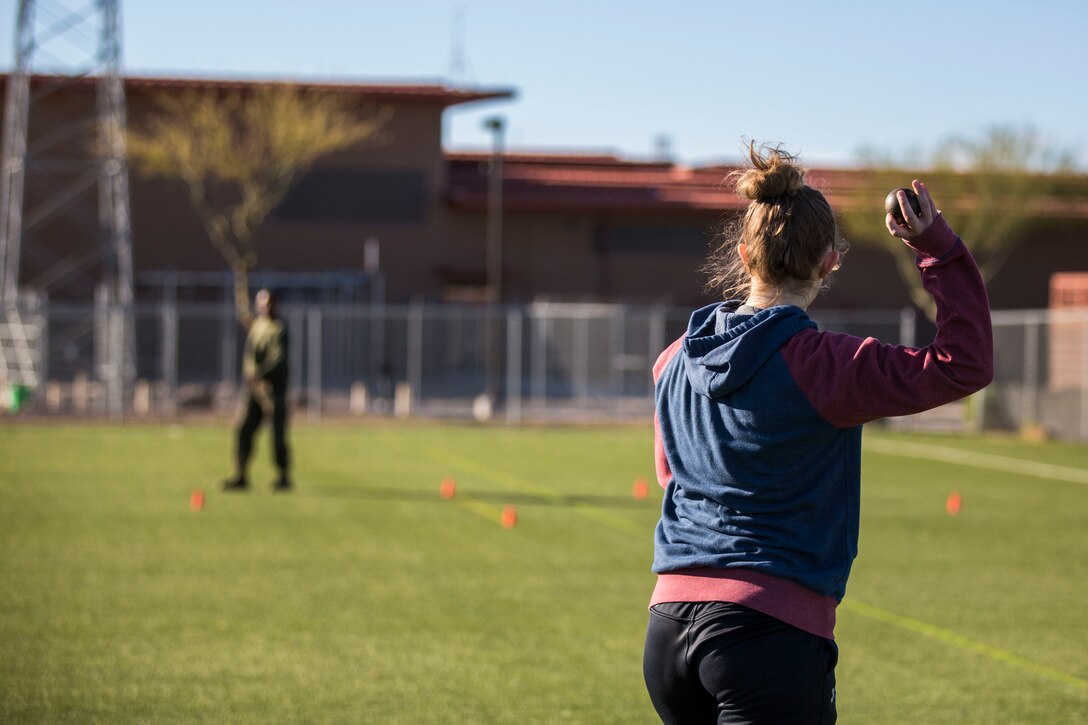 U.S. Marines assigned to Marine Aviation Logistics Squadron (MALS) 13 and their spouses participate in Jane Wayne Day at Marine Corps Air Station (MCAS) Yuma Jan. 25, 2019. Jane Wayne Day consisted of applying camouflage paint, getting some "drill instructor time", conducting a modified combat fitness test (CFT), going through the Obstacle Course, learning a few Marine Corps Martial Arts Program (MCMAP) techniques, and shooting the Beretta M9 Pistol. Jane Wayne Day is designed to give the spouses a little insight on some of the things their Marine does while having fun. (U.S. Marine Corps photo by Cpl. Sabrina Candiaflores)