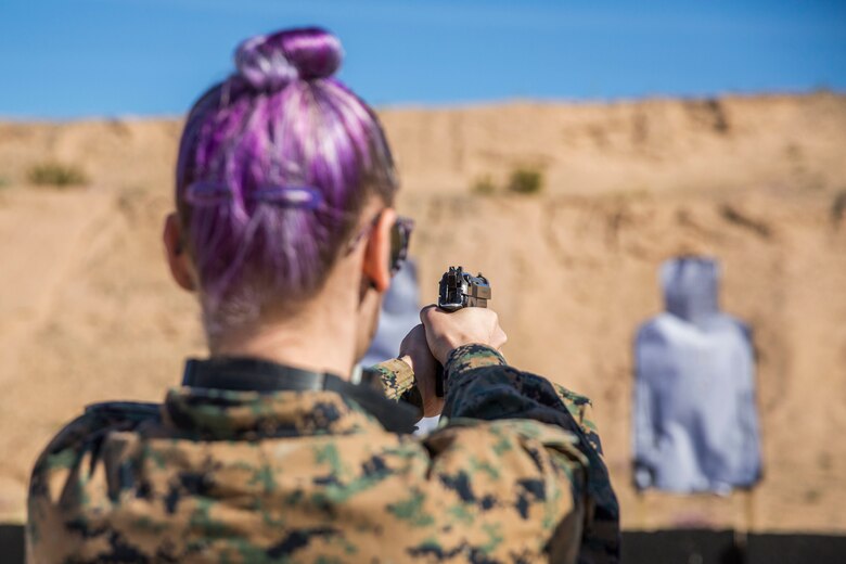 U.S. Marines assigned to Marine Aviation Logistics Squadron (MALS) 13 and their spouses participate in Jane Wayne Day at Marine Corps Air Station (MCAS) Yuma Jan. 25, 2019. Jane Wayne Day consisted of applying camouflage paint, getting some "drill instructor time", conducting a modified combat fitness test (CFT), going through the Obstacle Course, learning a few Marine Corps Martial Arts Program (MCMAP) techniques, and shooting the Beretta M9 Pistol. Jane Wayne Day is designed to give the spouses a little insight on some of the things their Marine does while having fun. (U.S. Marine Corps photo by Cpl. Sabrina Candiaflores)