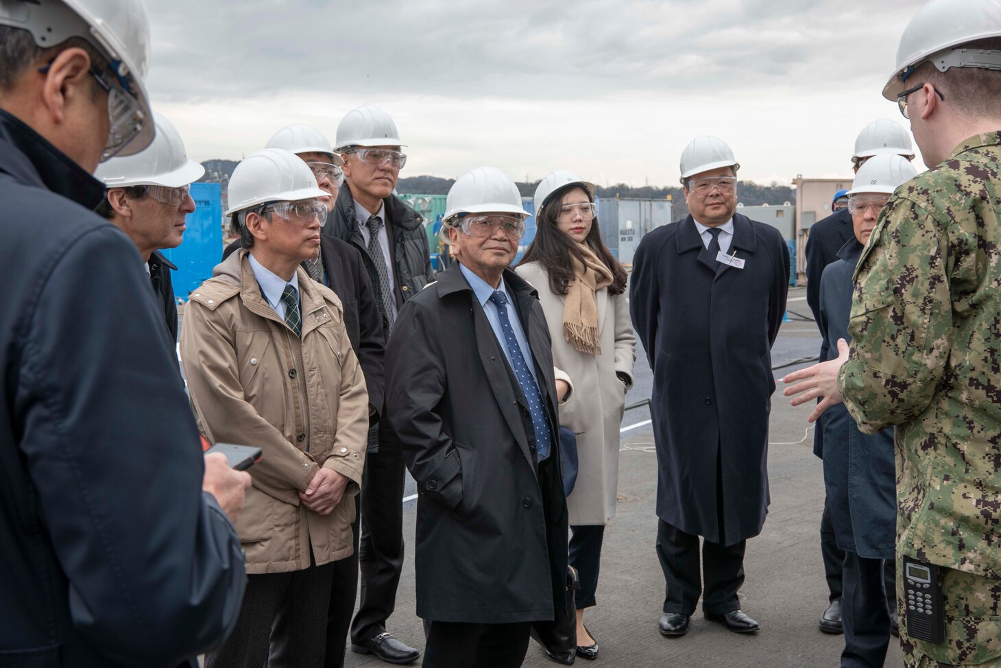 YOKOSUKA (Feb. 21, 2019) Chairman Masato Yasumoto, from Iwakuni Chamber of Commerce and Industry, tours aboard the Navy's forward-deployed aircraft carrier, USS Ronald Reagan (CVN 76). Ronald Reagan, the flagship of Carrier Strike Group 5, provides a combat-ready force that protects and defends the collective maritime interests of its allies and partners in the Indo-Pacific region.