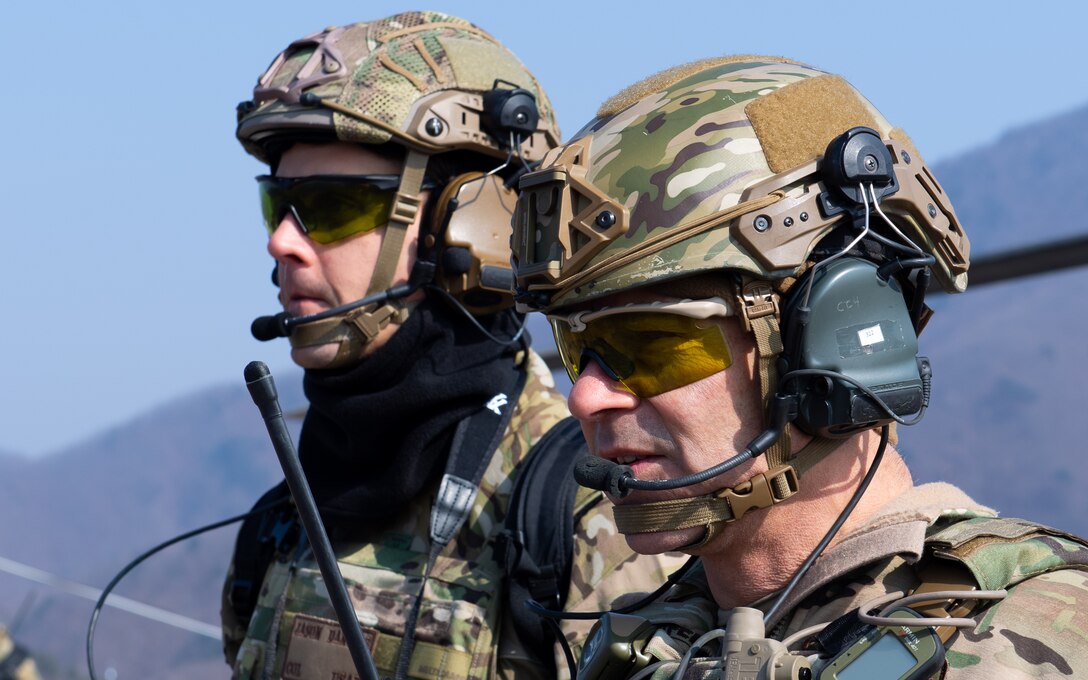 Lt. Gen. Kenneth S. Wilsbach, 7th Air Force Commander, right, talks to a joint terminal attack controller at the Pilsung Range in Gangwan Province, Republic of Korea, Feb. 14, 2019