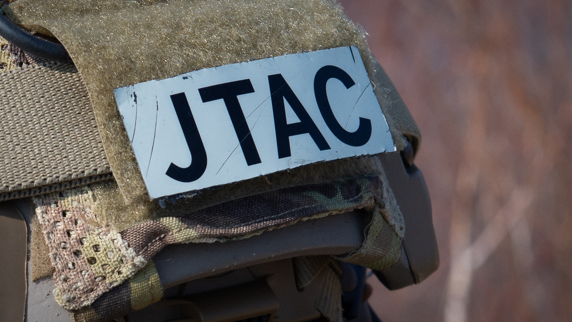 A joint terminal attack controller’s flash is affixed to the helmets of all JTAC personnel as a means of identifying their specific skills during close air support training at Pilsung Range in Gangwan Province, Republic of Korea, Feb. 14, 2019.